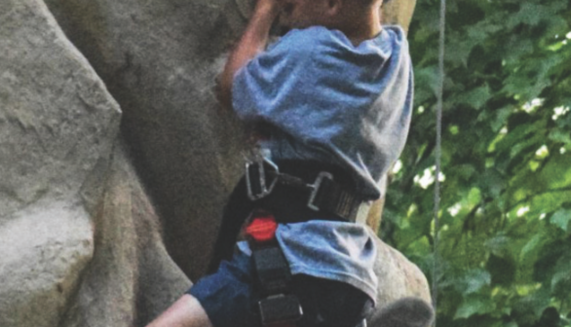 Child rock climbing