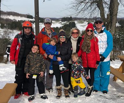 Exley Family photo outside ski lodge