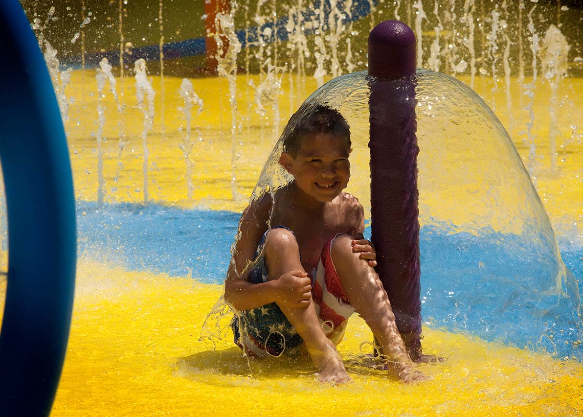 Child at the splash pad